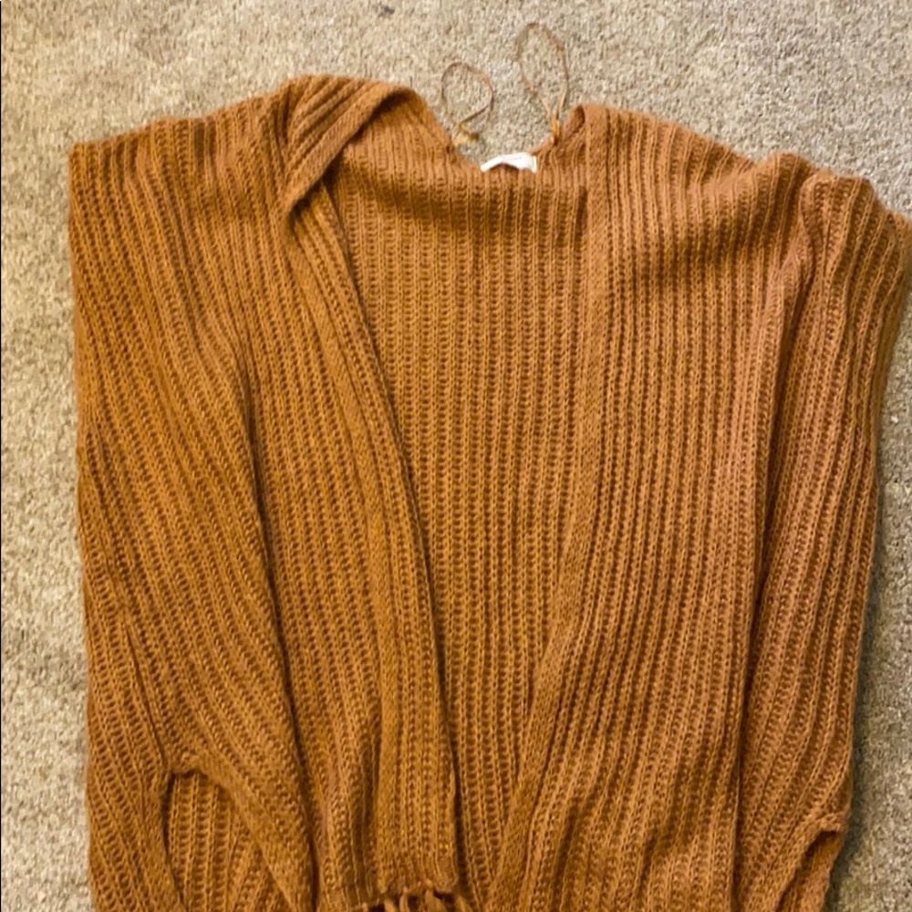 Sleeveless oversized open sweater